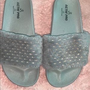 grey fluffy slides